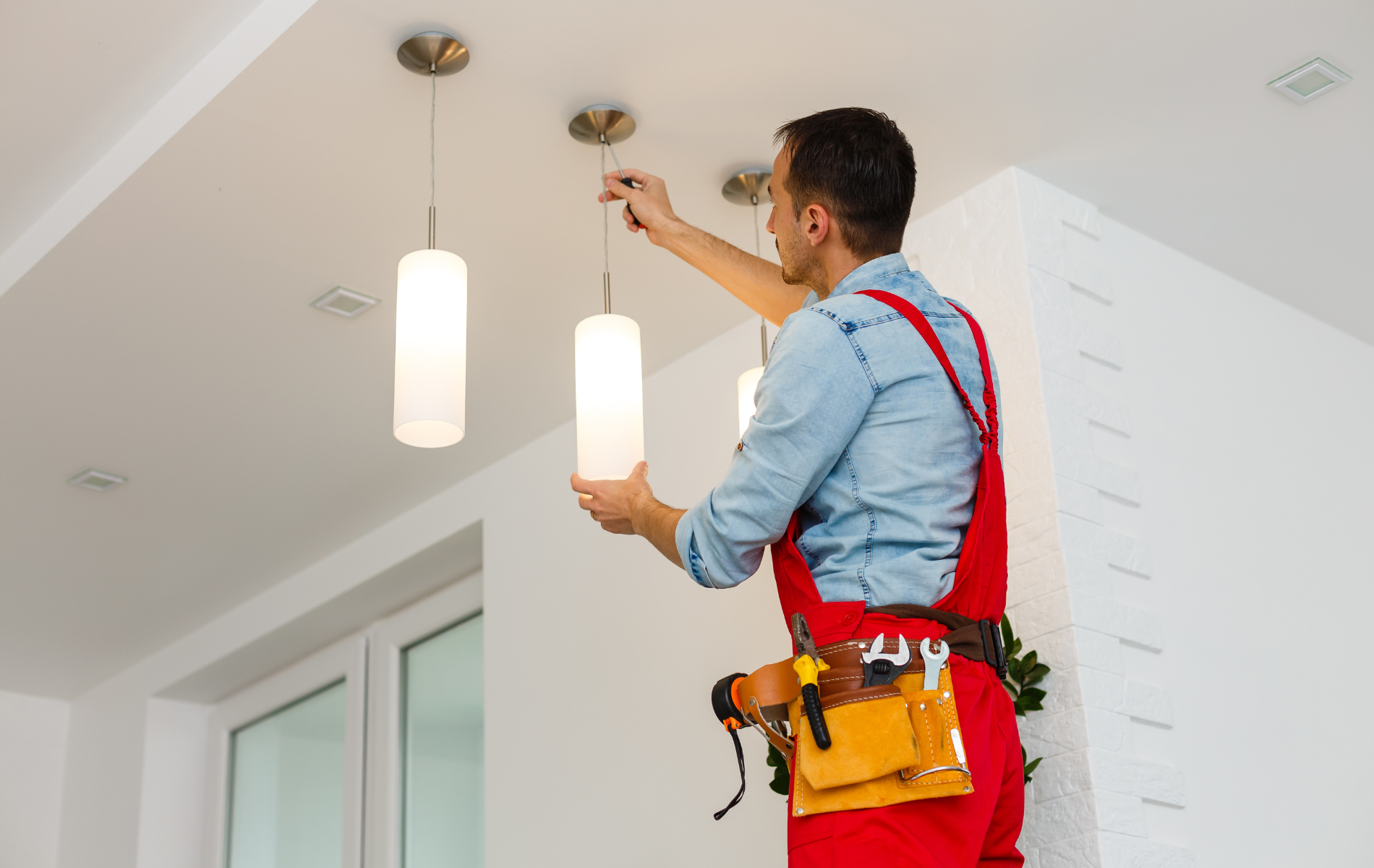 electrician working on lighting